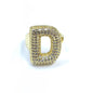 Gold ring with letter 'D' design on a white background
