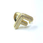 Gold ring with letter 'F' design on a white background
