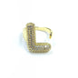 Gold letter 'L' earring with diamonds on a white background