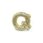 Gold letter 'Q' charm with embedded stones on a white background