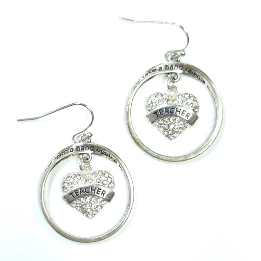 Silver earrings with heart-shaped charms and 'Teacher' text on a white background