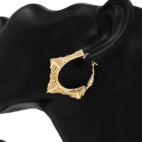 Geometric filigree hoop earrings featuring intricate openwork metal design with sculptural architectural silhouette.