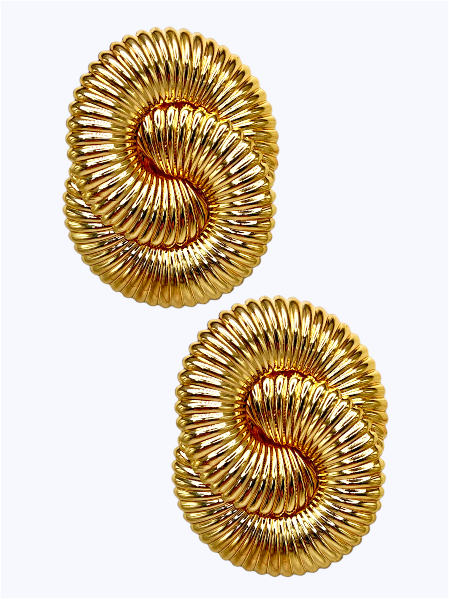 Gold-tone textured swirl statement stud earrings with sculptural ribbed design for modern luxury boutique fashion accessories collection
