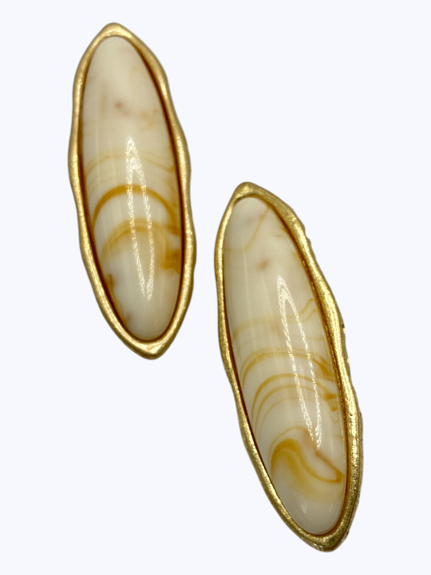 Modern elongated oval drop earrings featuring turquoise-style marbled resin center with sleek metallic frame.