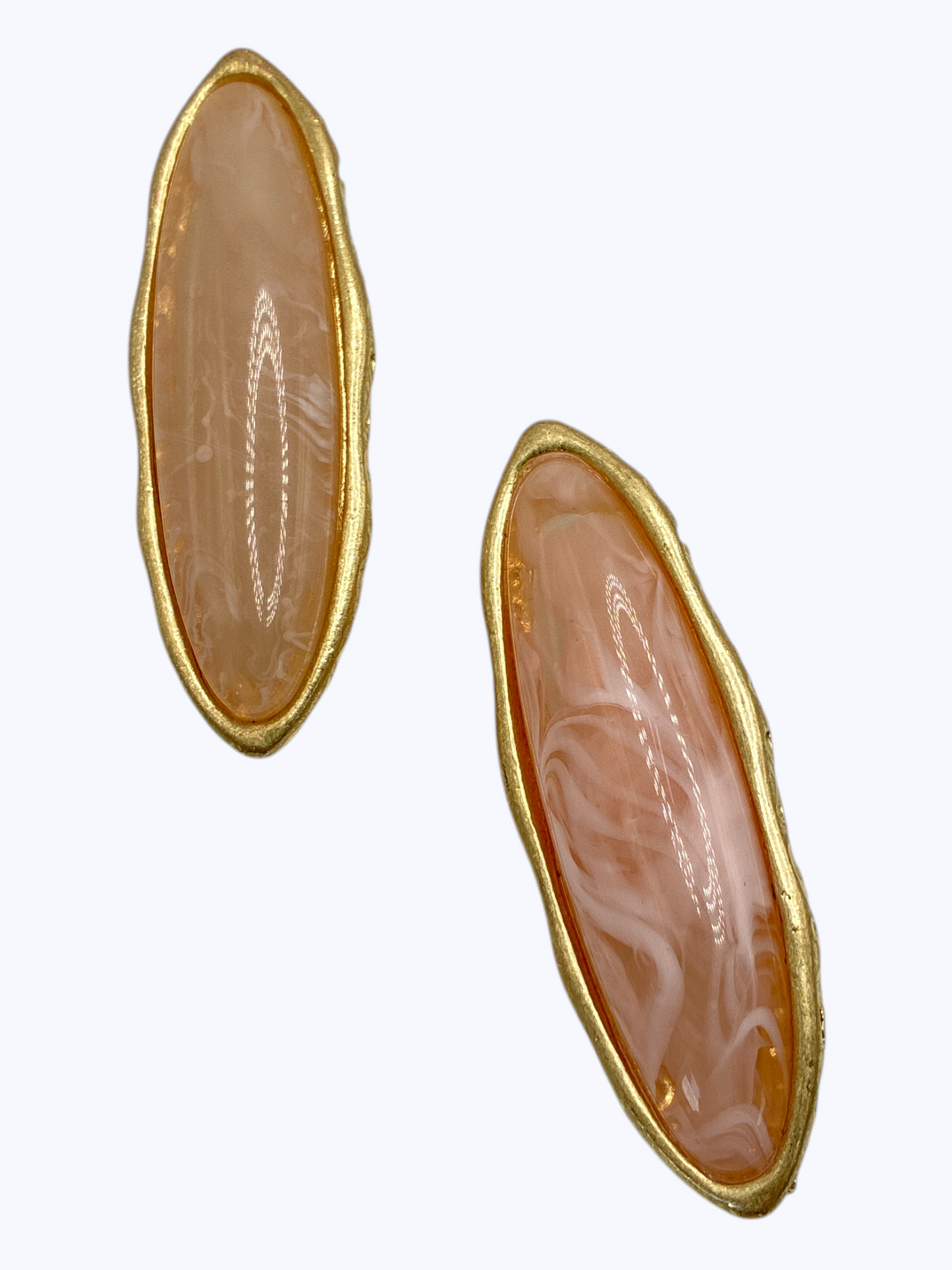 Modern elongated oval drop earrings featuring turquoise-style marbled resin center with sleek metallic frame.