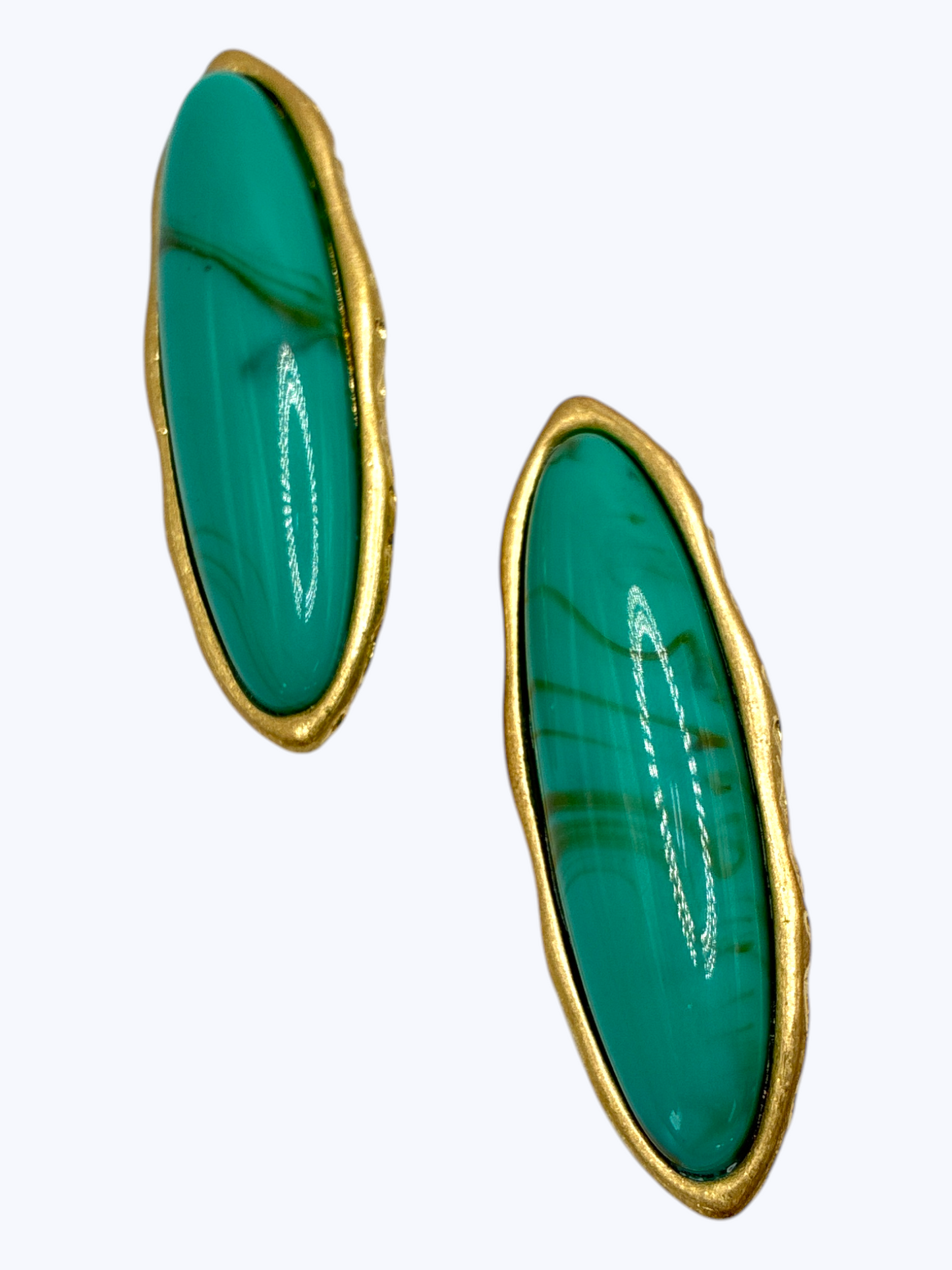 Modern elongated oval drop earrings featuring turquoise-style marbled resin center with sleek metallic frame.
