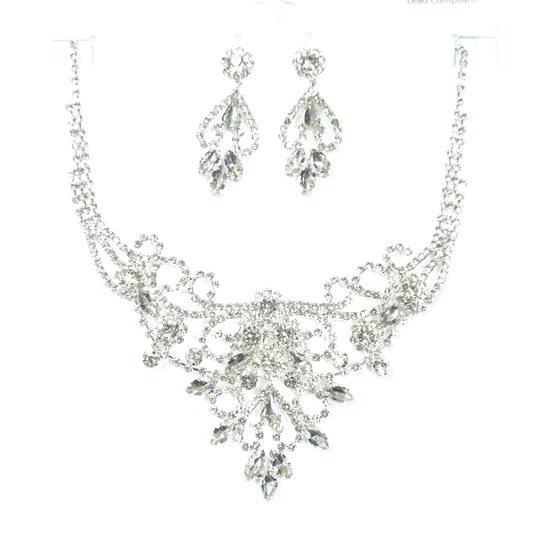 Silver jewelry set with necklace and earrings on a white background