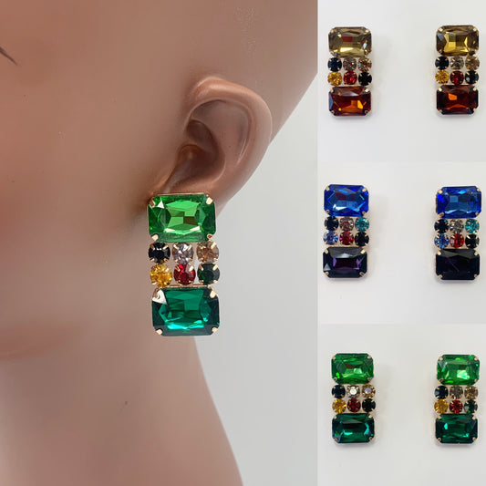 Rectangular crystal drop earrings with multicolor gemstone-inspired accents in a bold glamorous boutique style.