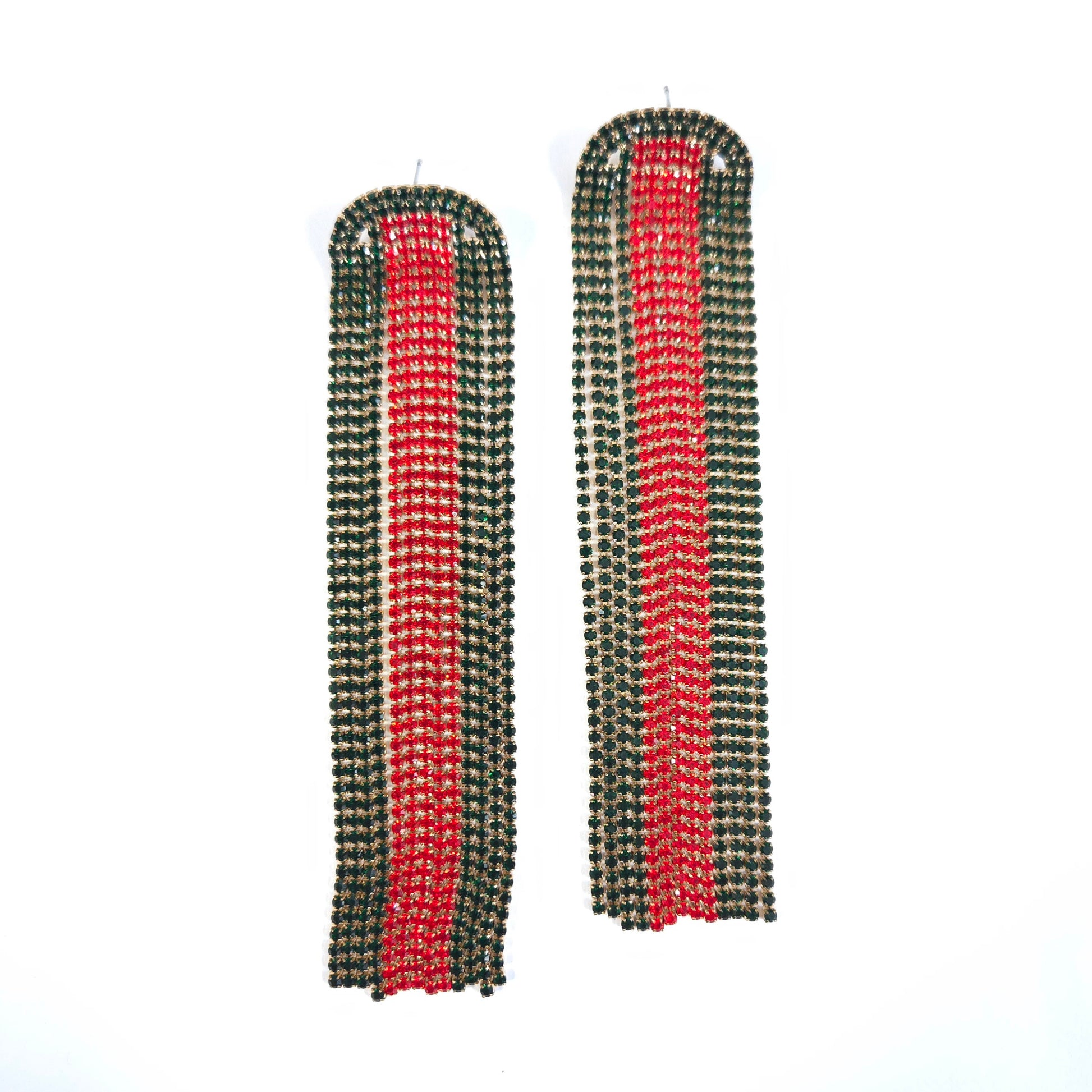 Pair of long, rectangular earrings with red and green striped pattern on a white background