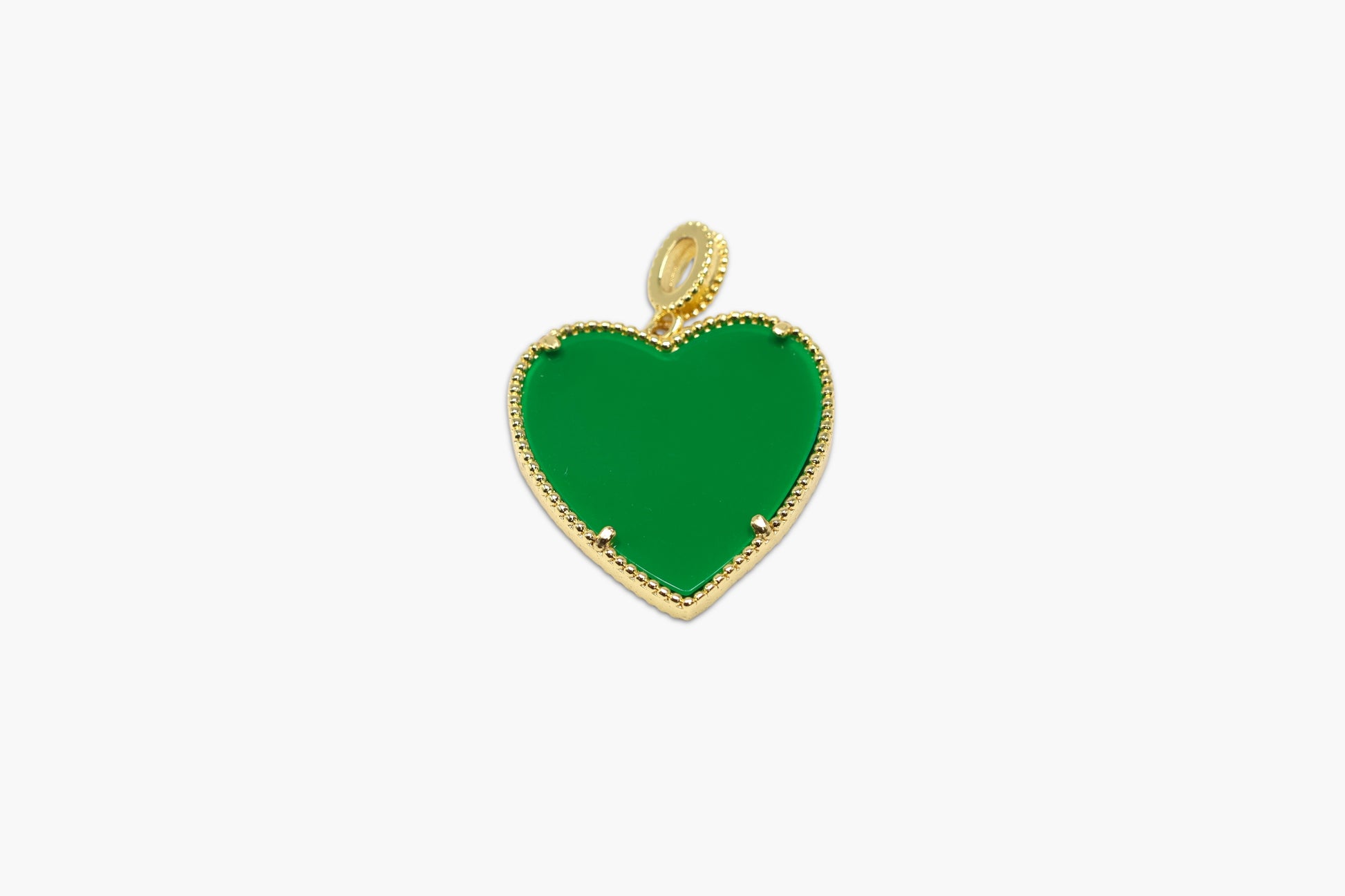 Green heart-shaped pendant with gold border on a white background