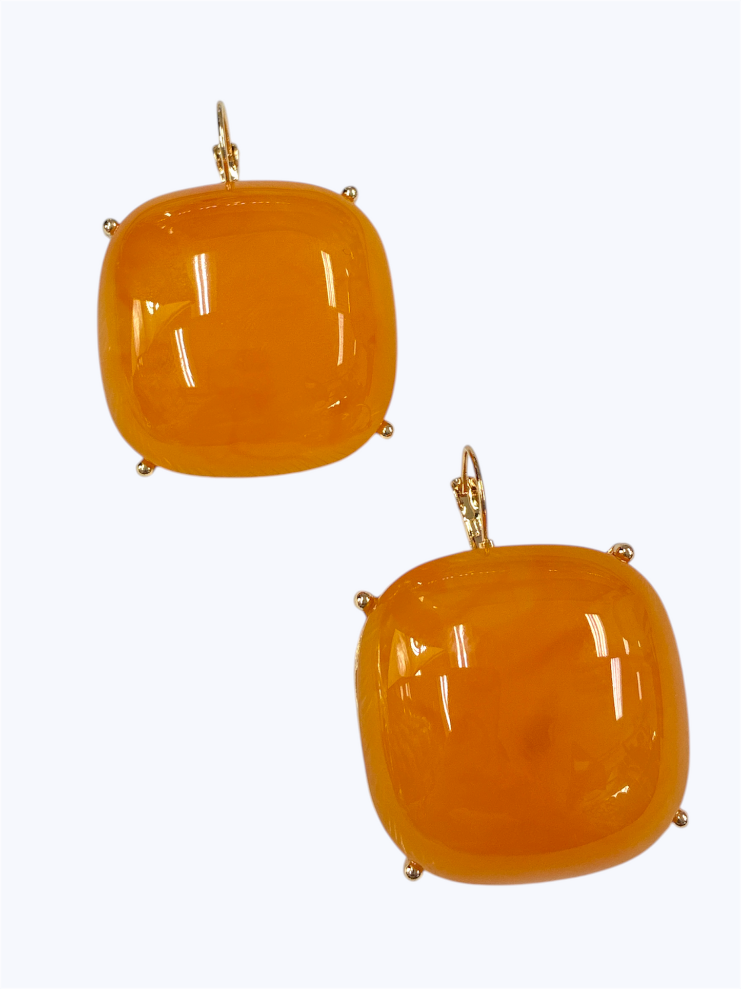 Bold square resin drop earrings with glossy finish and modern geometric silhouette for boutique fashion styling.