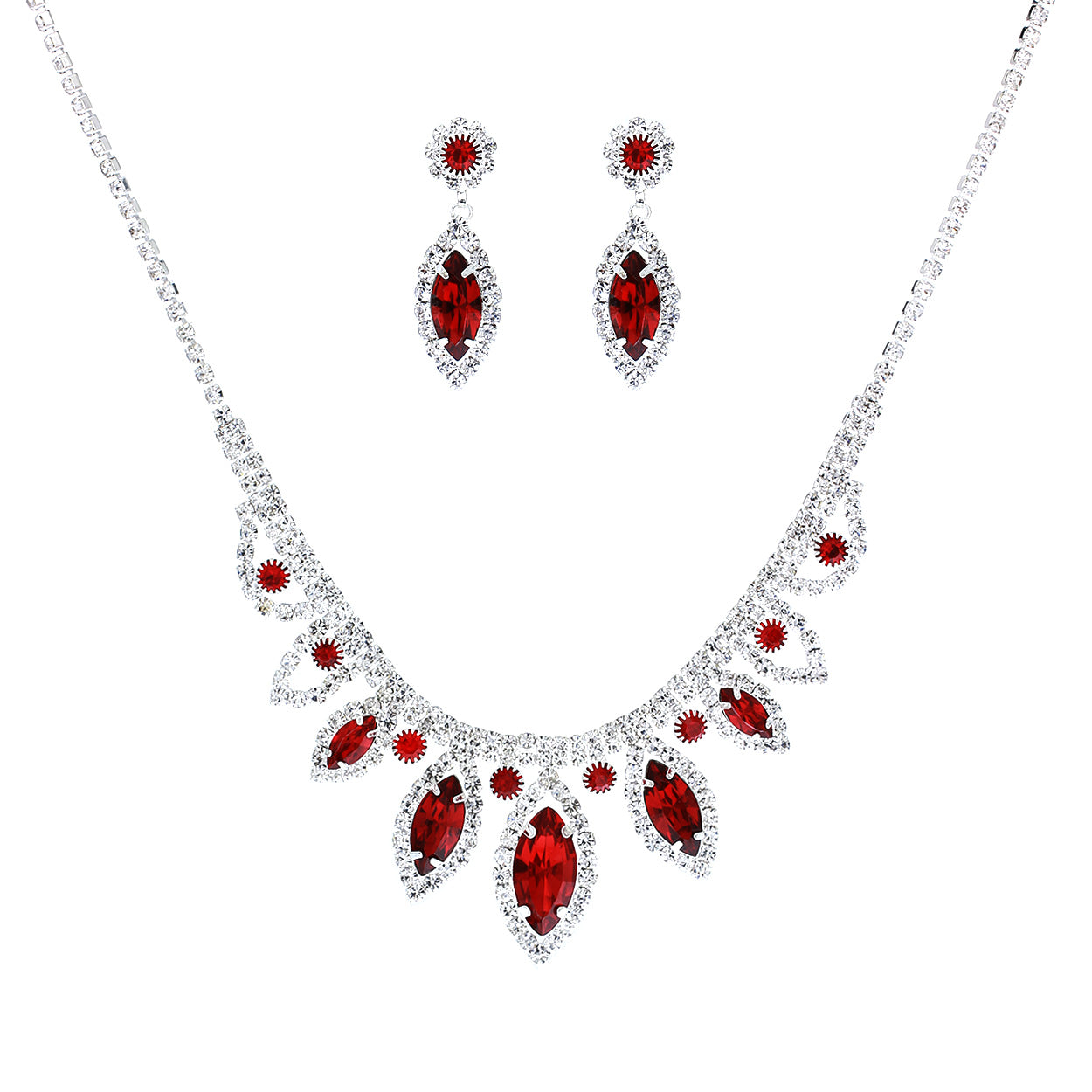 Jewelry set with red gemstones on a white background