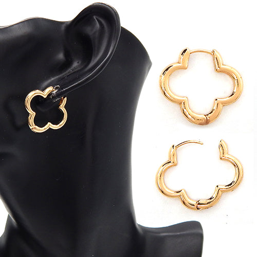 Minimal floral outline stud earrings with lightweight open petal design displayed in boutique retail packaging.