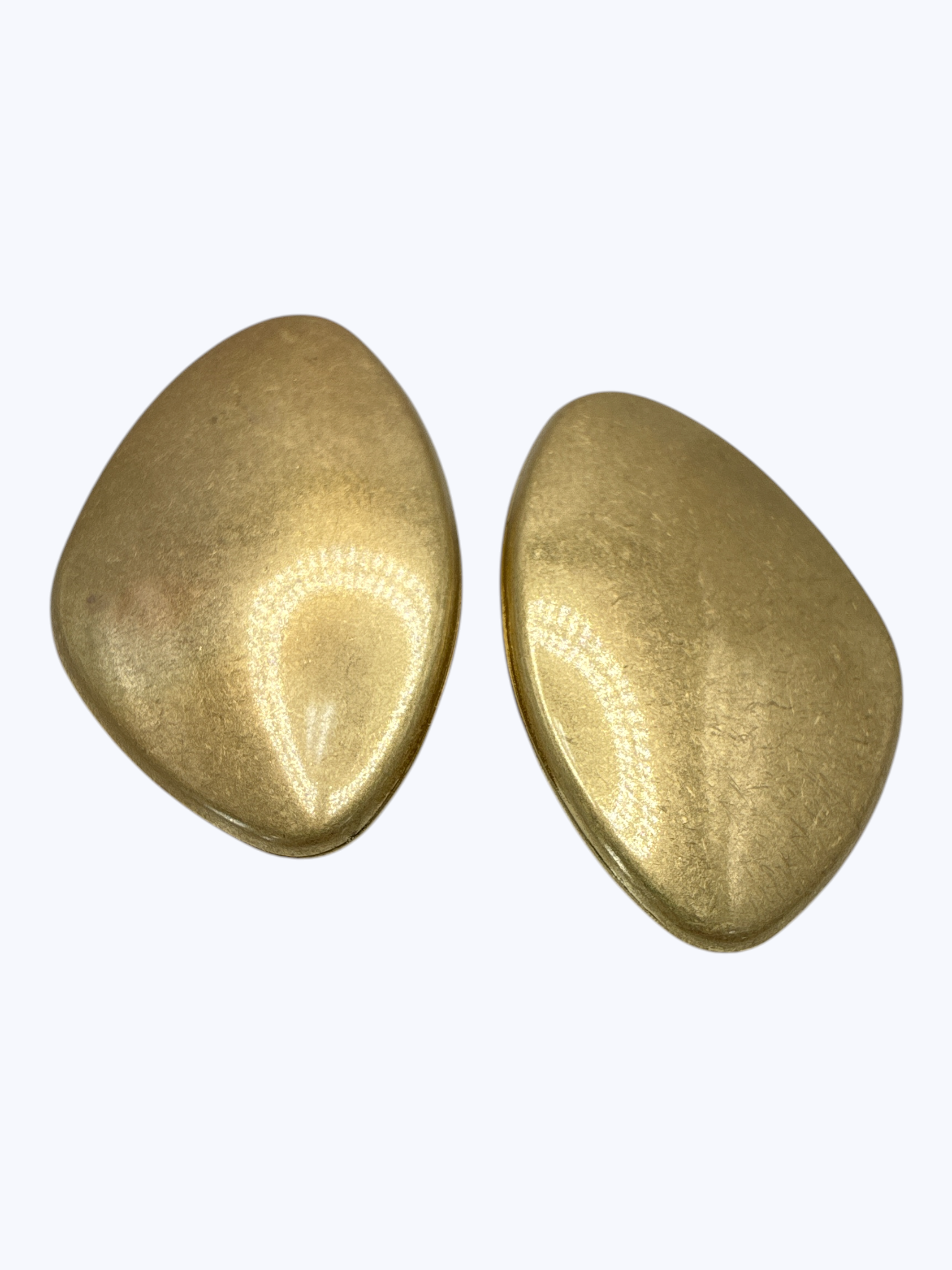 Modern organic-shaped stud earrings featuring smooth sculptural matte metal design with minimalist contemporary styling.