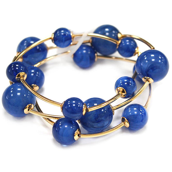 Multi strand acrylic bead coil bracelet with glossy round beads and gold wire accents in royal blue
