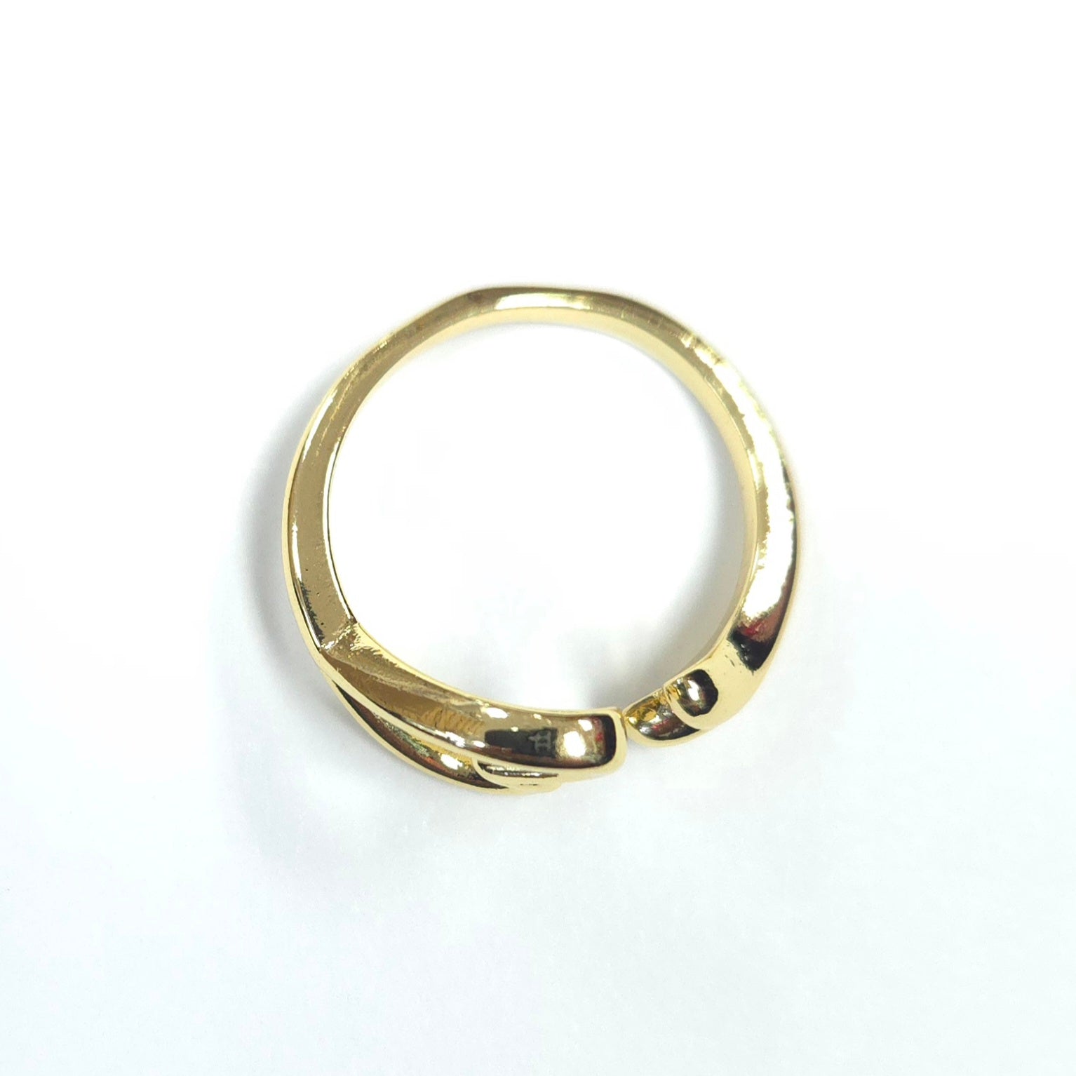 Gold ring on a white background