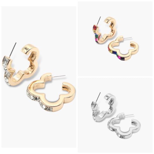 A set of earrings featuring a clover shape with rhinestone accents, presented in gold, silver, and multicolored variations.