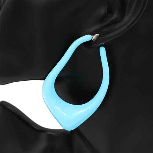 Oversized sculptural hoop earrings with abstract curved teardrop shape and glossy finish