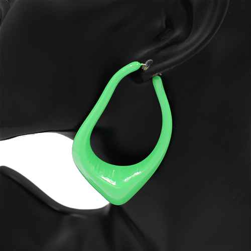 Oversized sculptural hoop earrings with abstract curved teardrop shape and glossy finish
