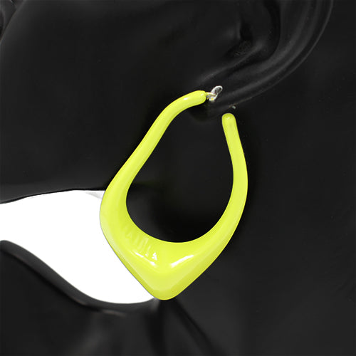 Oversized sculptural hoop earrings with abstract curved teardrop shape and glossy finish