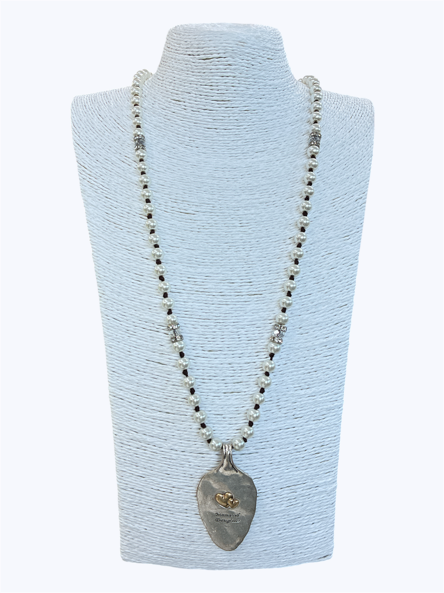 Long beaded necklace featuring a rustic heart pendant with mother and daughter inspired sentimental charm detailing.
