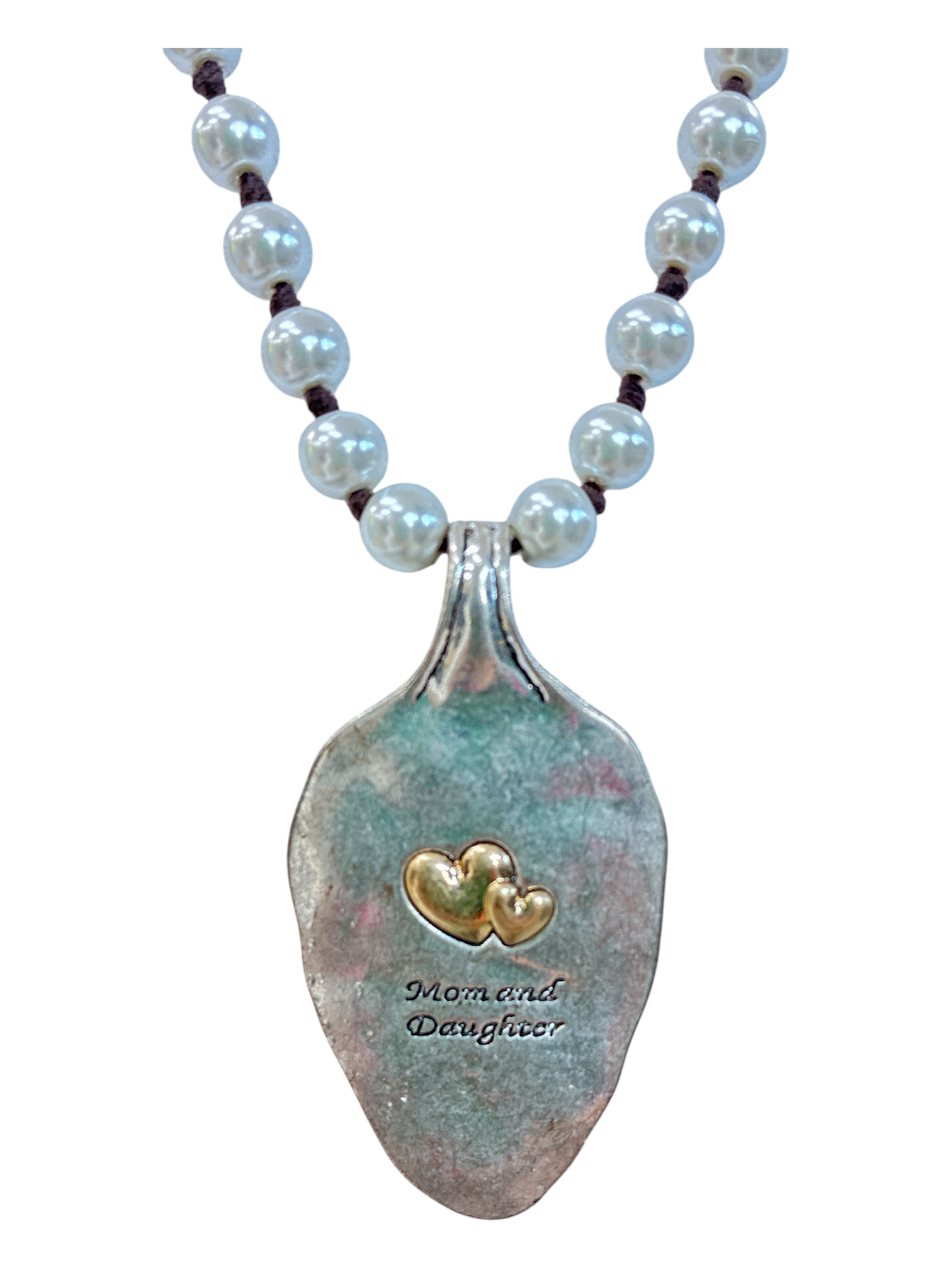 Long beaded necklace featuring a rustic heart pendant with mother and daughter inspired sentimental charm detailing.