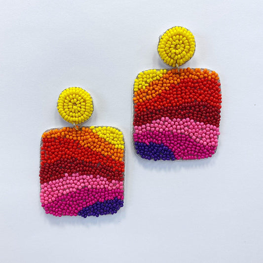 A mosaic earrings on a white background