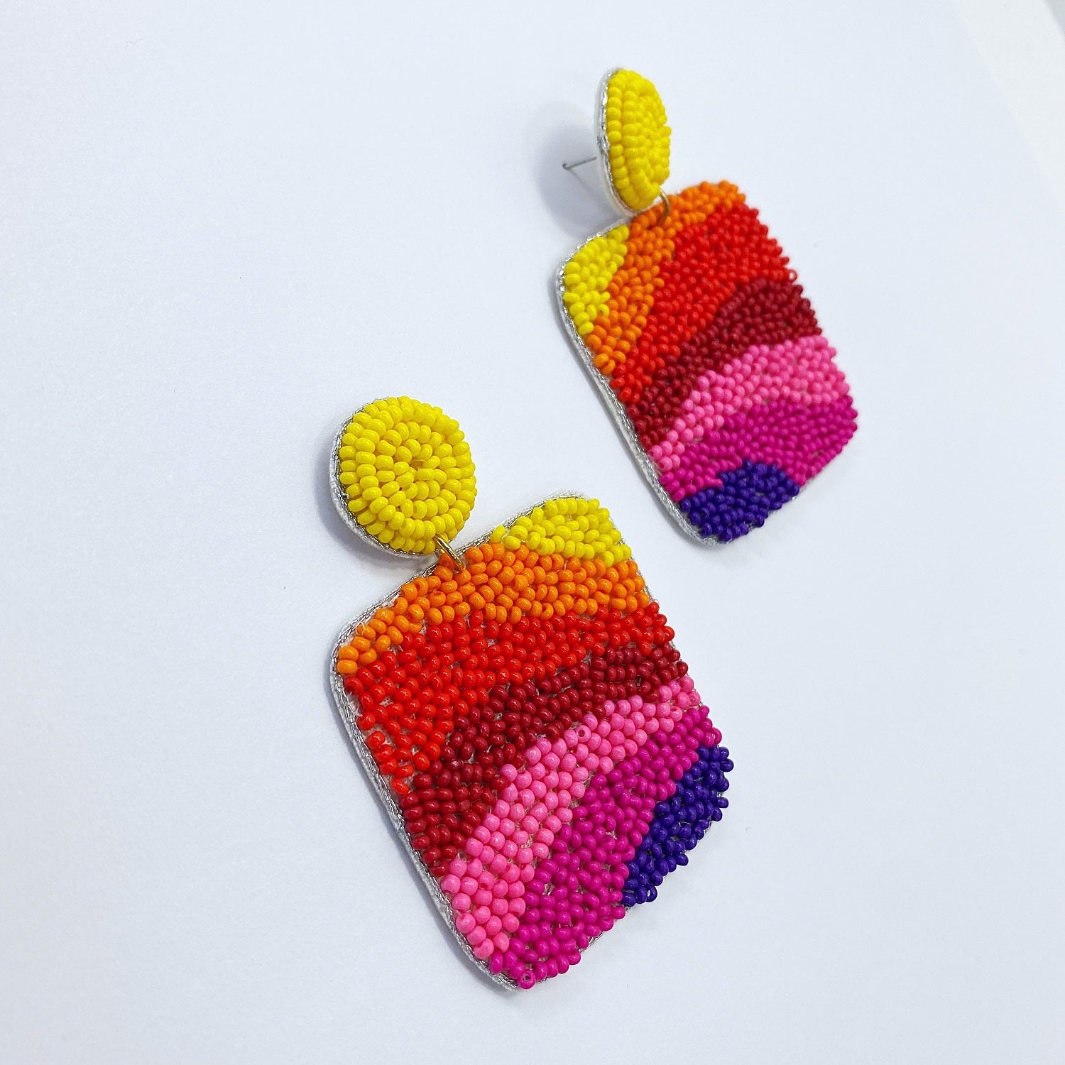 A mosaic earrings on a white background