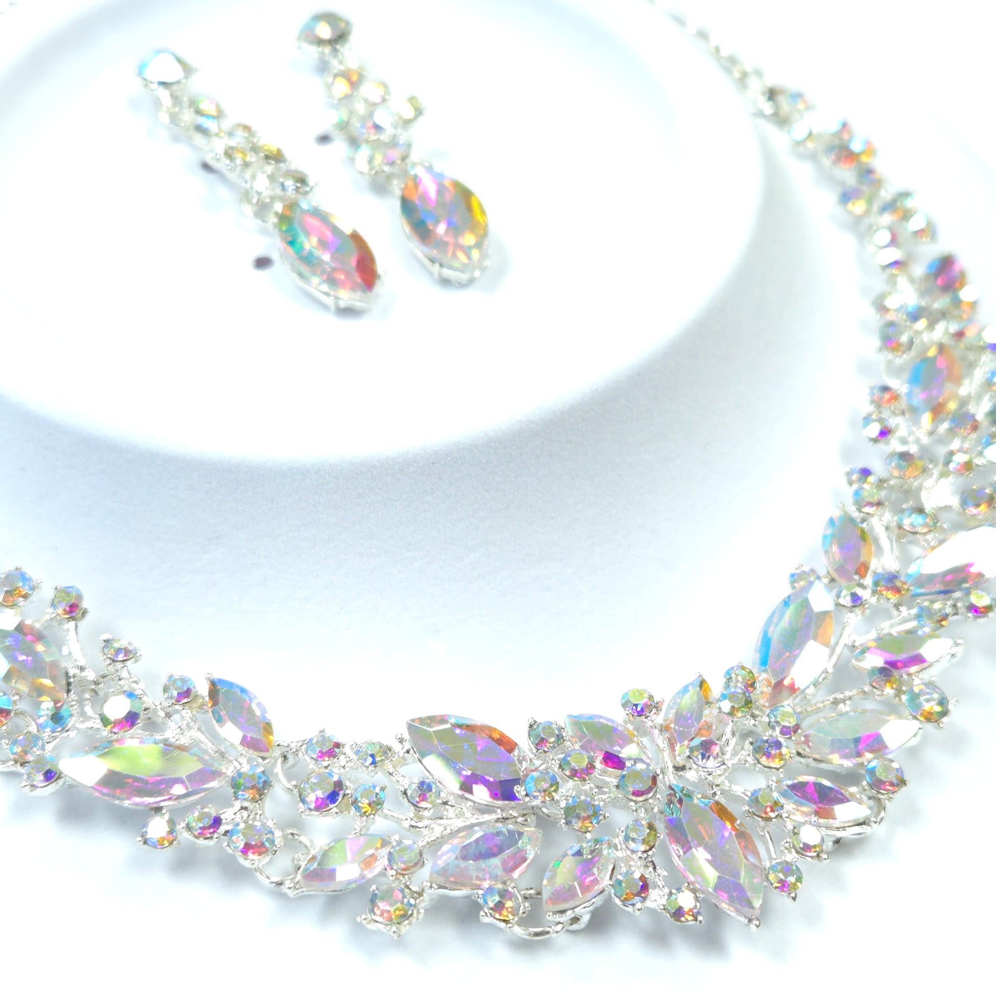 Crystal headband and earrings set on a white background