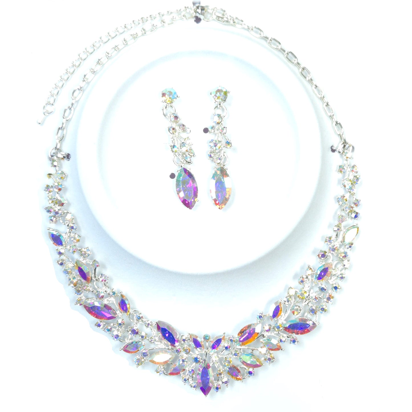Jewelry set with necklace and earrings on a white background