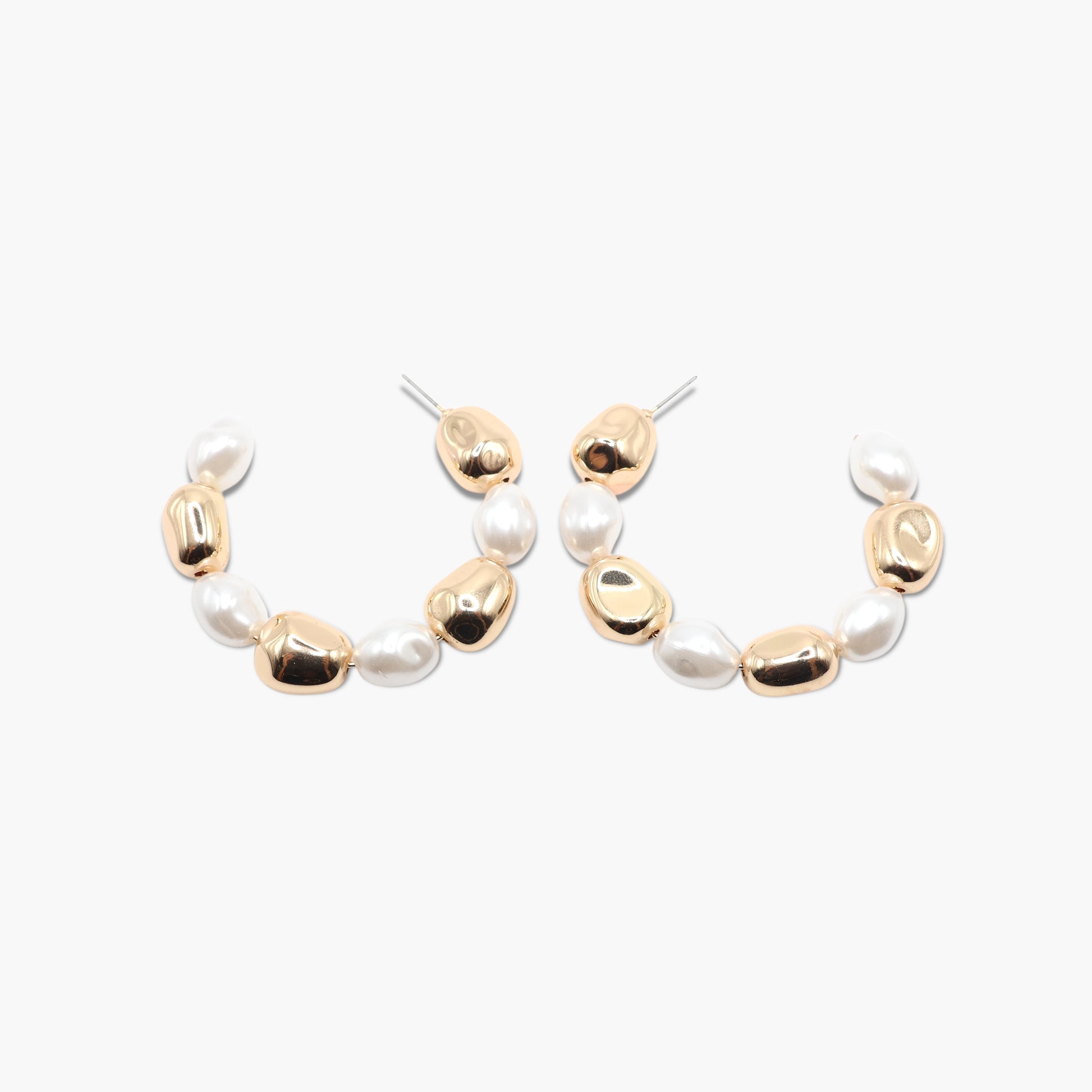 A pair of gold-colored hoop earrings with white pearl accents.