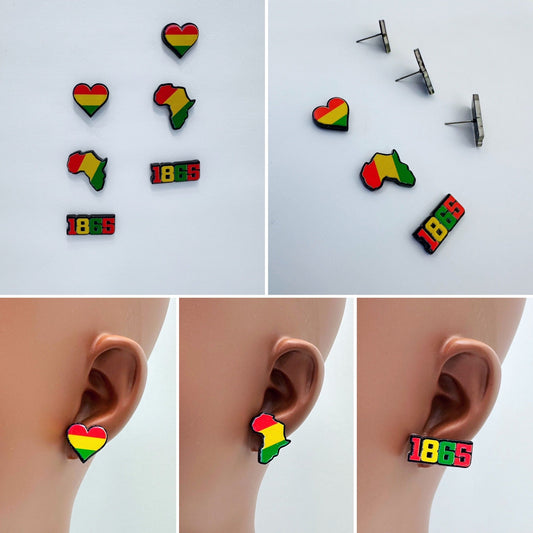 A set of multi-colored acrylic stud post earrings displayed on a mannequin ear. The earrings come in various colors with designs resembling flags and the number 185.