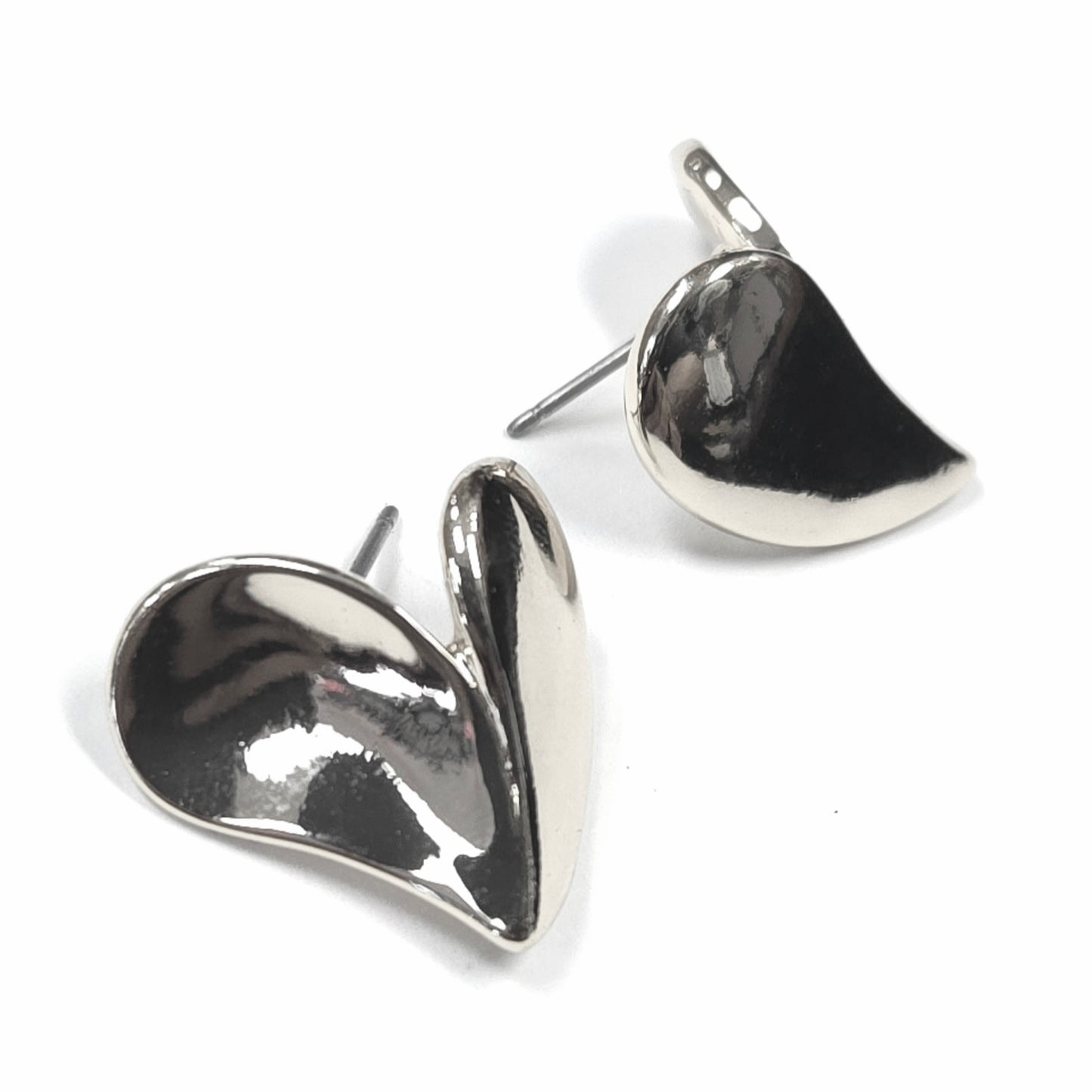 Silver teardrop-shaped earrings on a white background