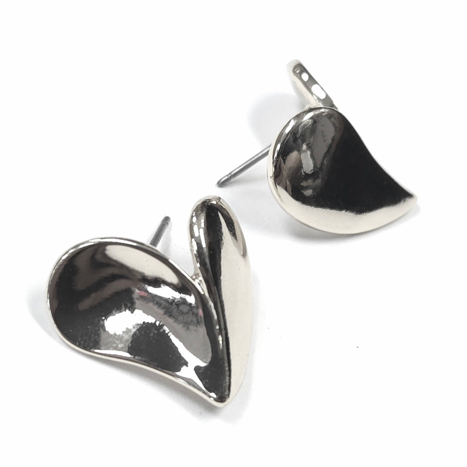 Silver teardrop-shaped earrings on a white background