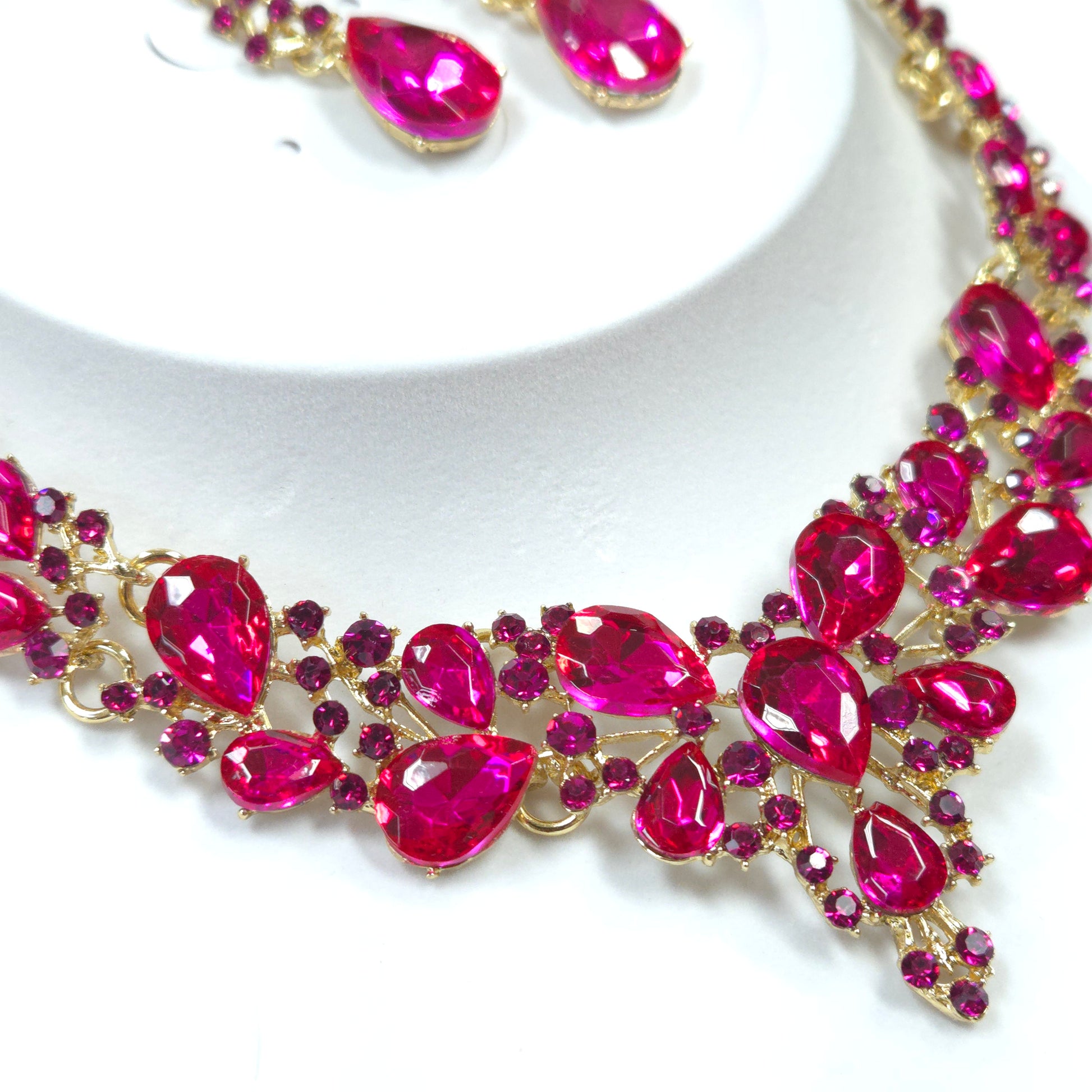 Necklace with pink gemstones on a white background