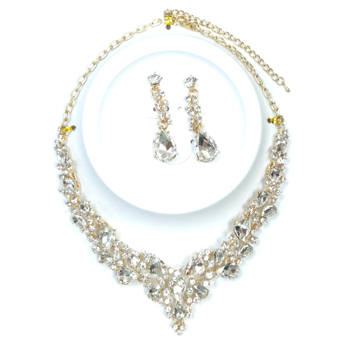 Jewelry set with necklace and earrings on a white background