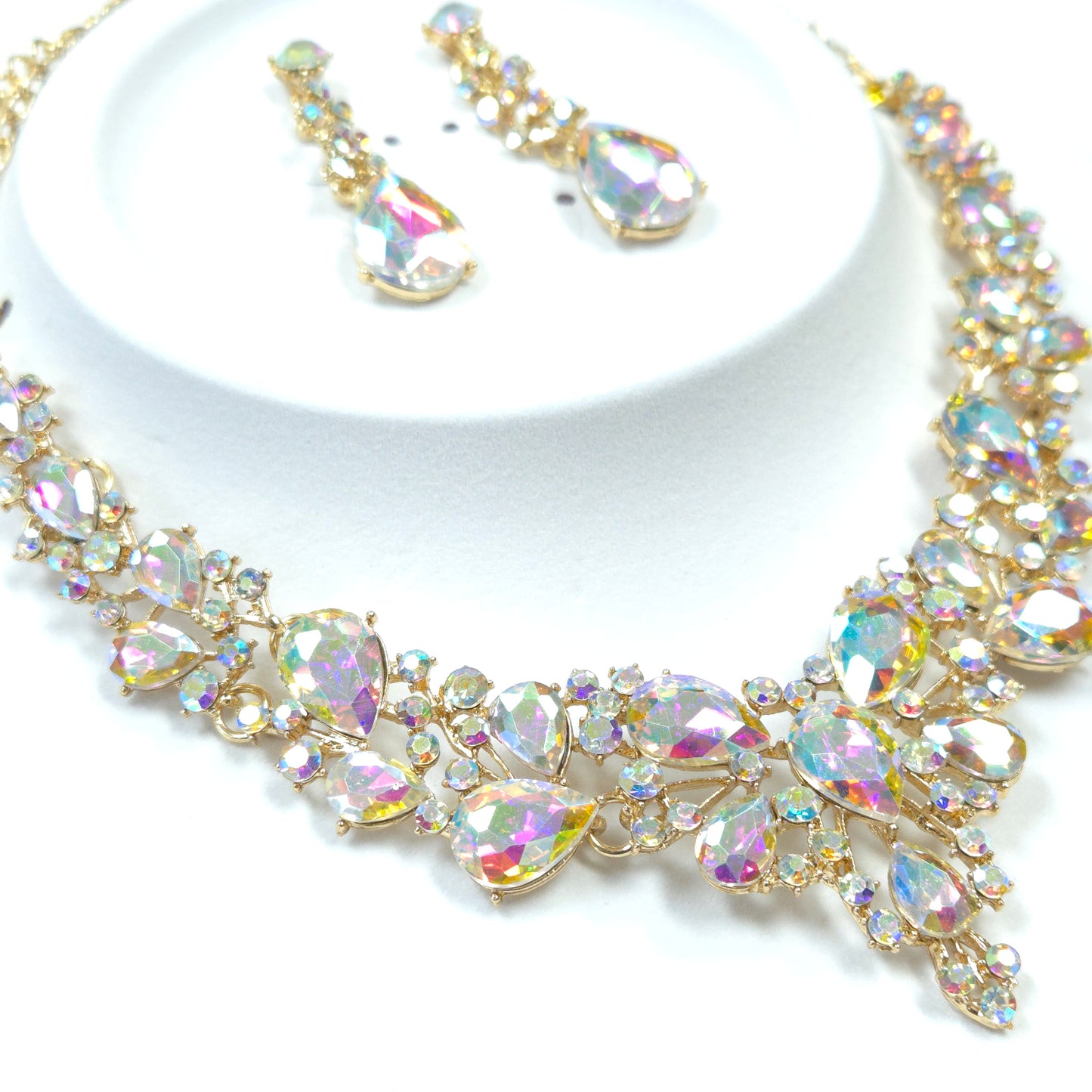 Gold headband with colorful crystals on a white background