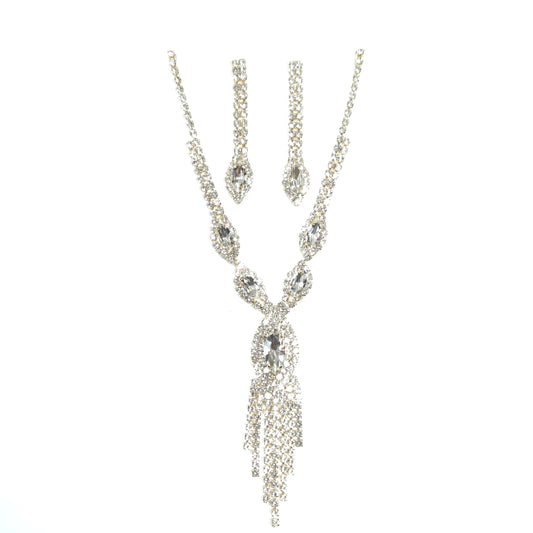 Silver necklace with crystal-like stones on a white background