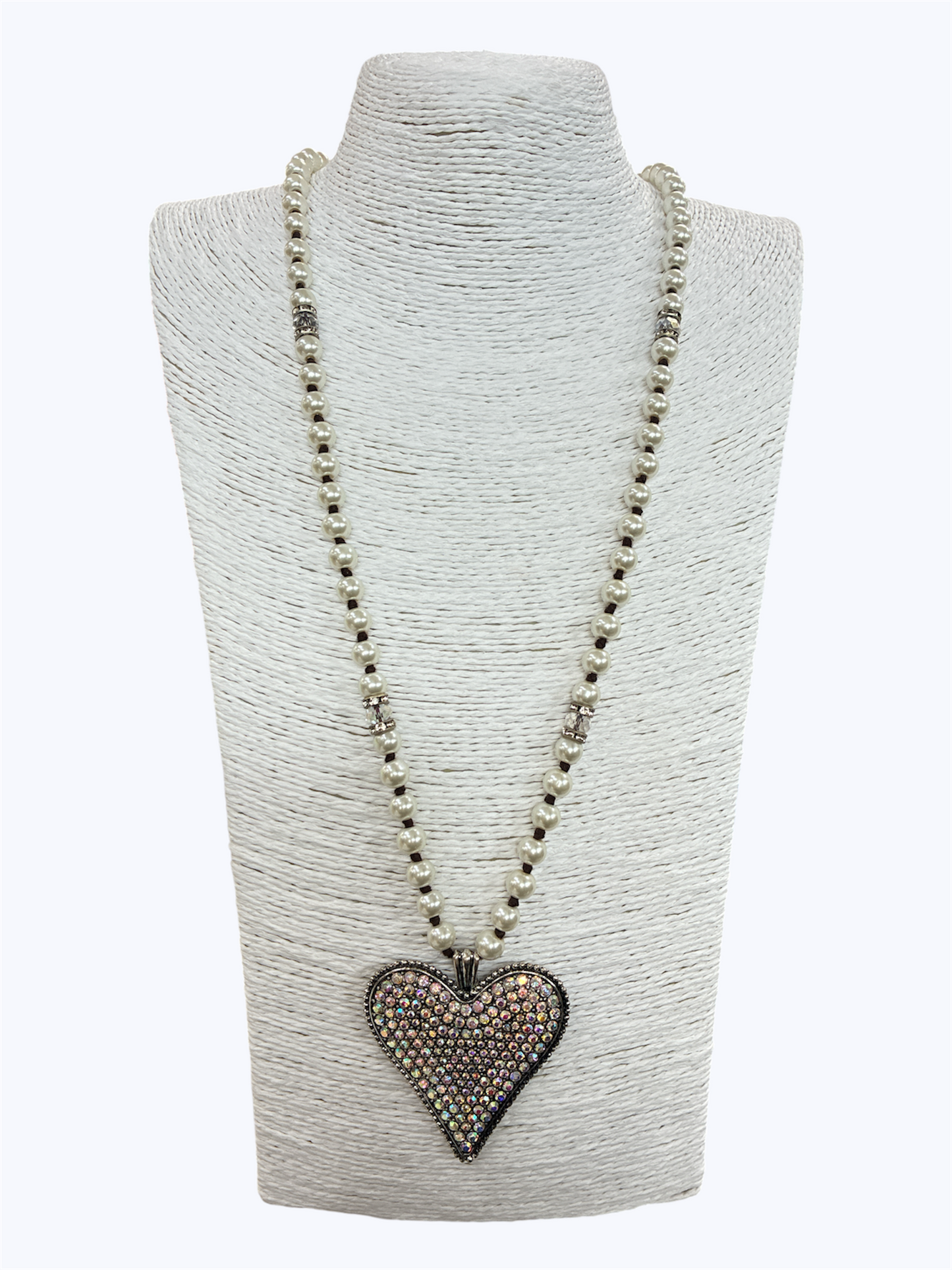 Long faux pearl beaded necklace featuring a large crystal rhinestone heart pendant with vintage-inspired detailing.