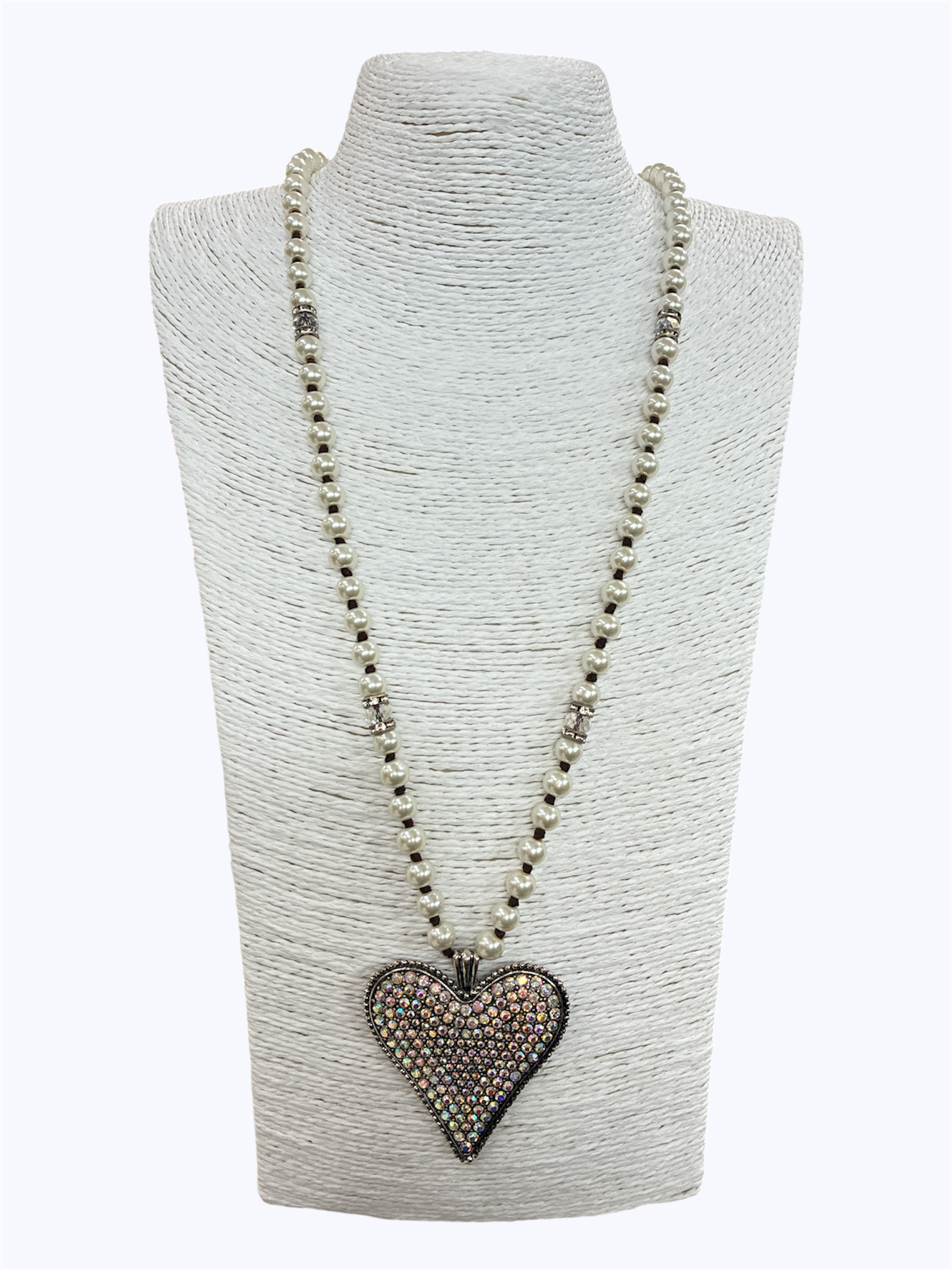 Long faux pearl beaded necklace featuring a large crystal rhinestone heart pendant with vintage-inspired detailing.