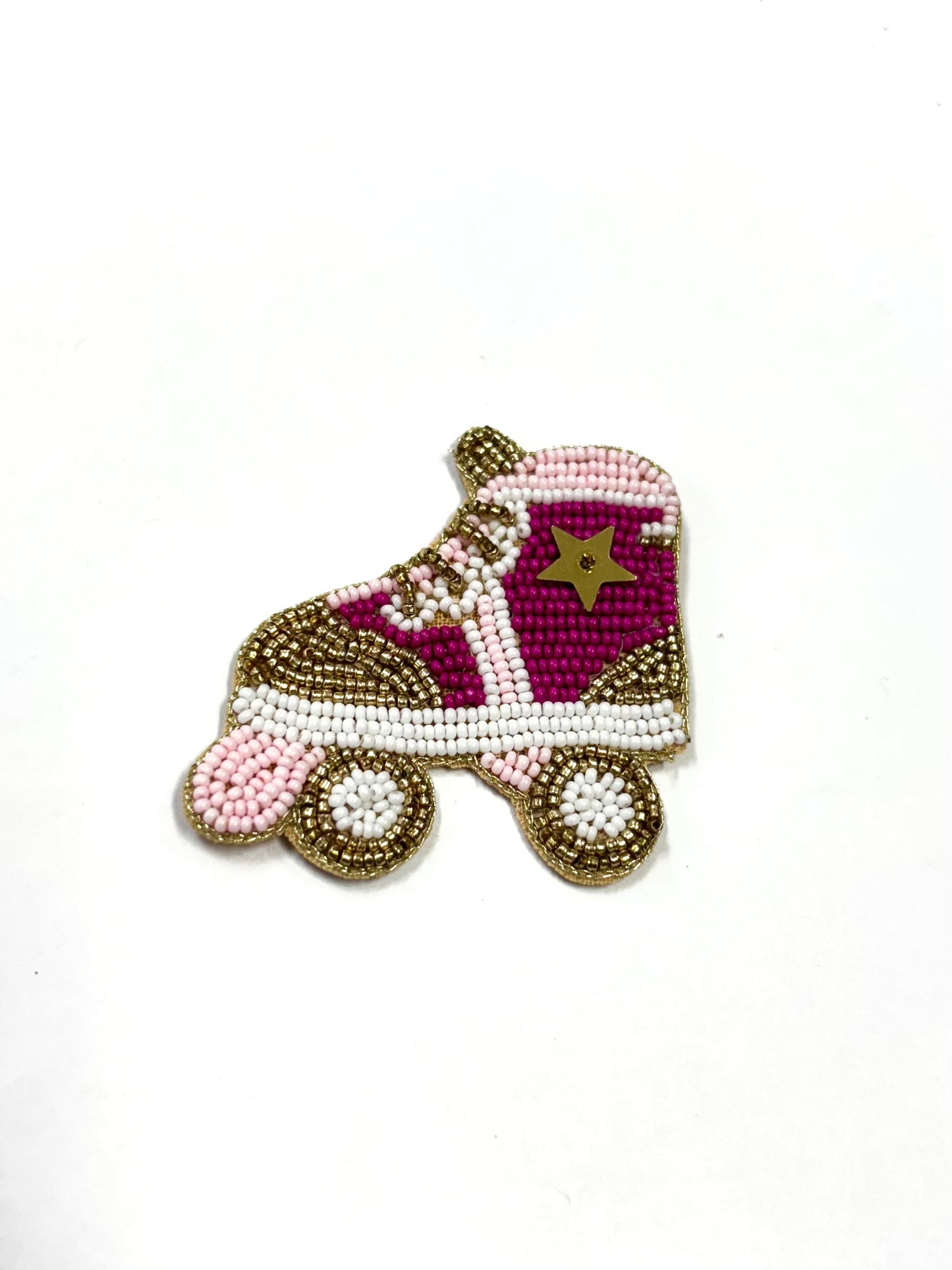 Decorative beaded roller skate on a white background