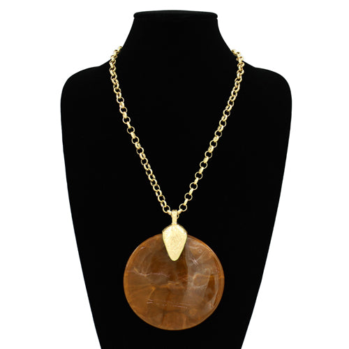 Oversized round resin pendant necklace with a textured disc charm on a link chain.