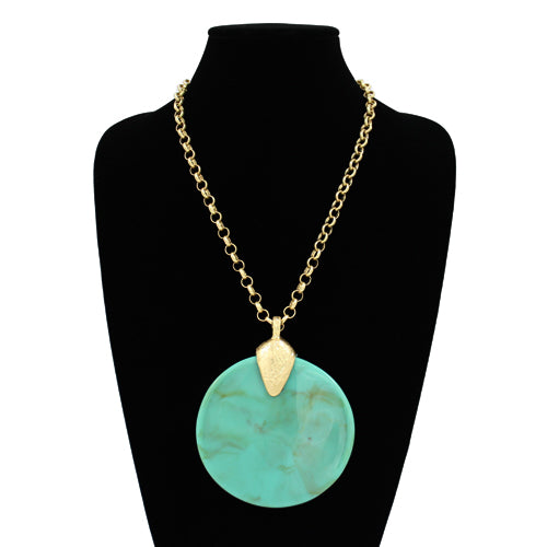 Oversized round resin pendant necklace with a textured disc charm on a link chain.