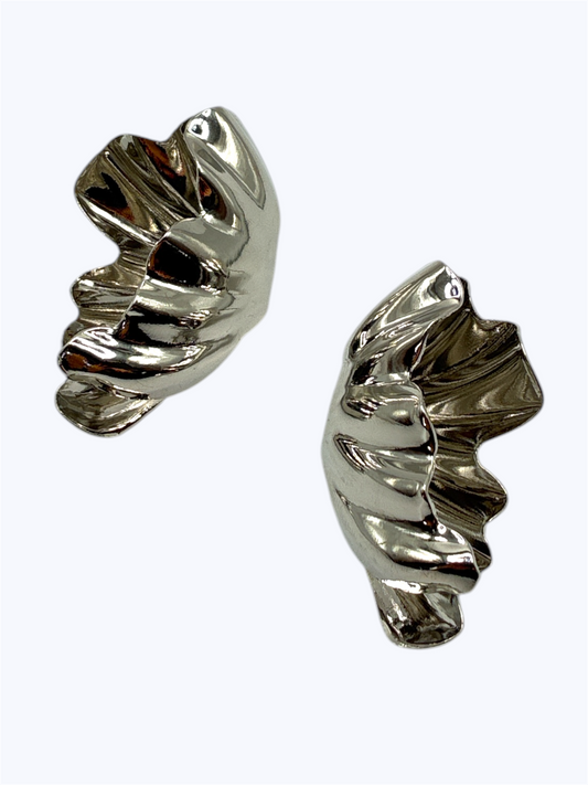 Pair of silver spiral earrings on a white background