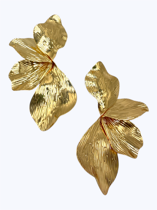 Textured abstract petal drop earrings with sculpted botanical design and flowing organic shape.