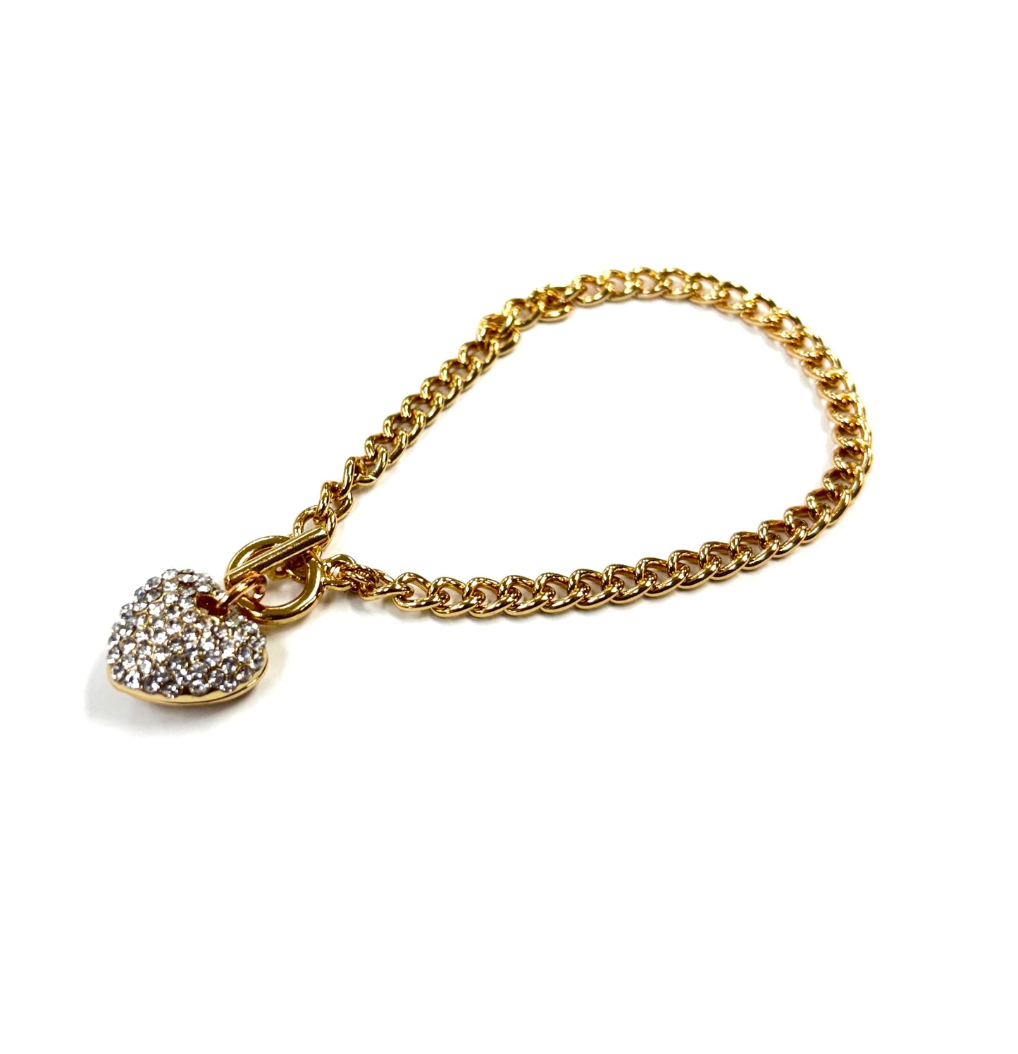 Gold chain bracelet with a heart-shaped charm on a white background