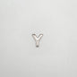 Silver letter 'Y' charm on a light gray background
