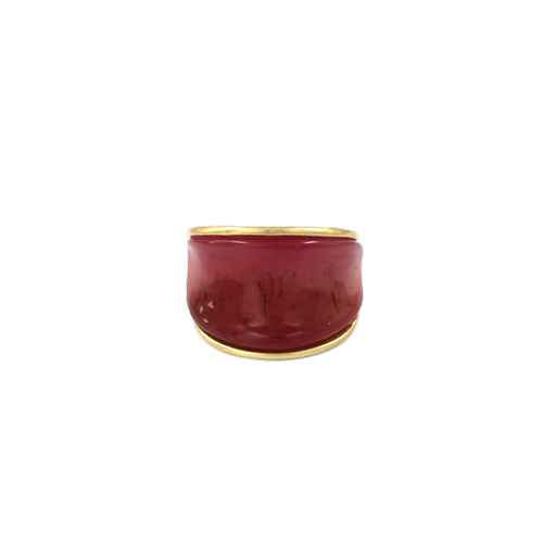 Wide resin band ring with glossy marbled finish and sleek metallic trim in a modern minimalist design.