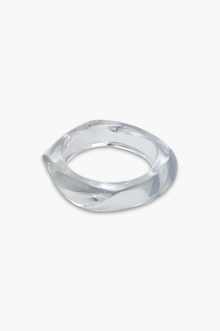 Minimalist marbled resin bangle bracelet with rounded square shape and polished glossy finish.