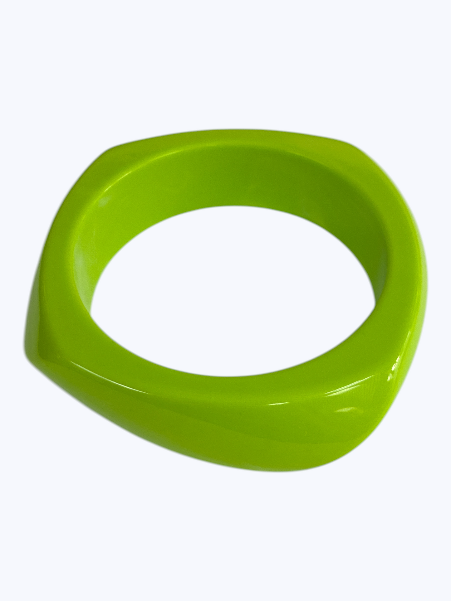 Minimalist marbled resin bangle bracelet with rounded square shape and polished glossy finish.